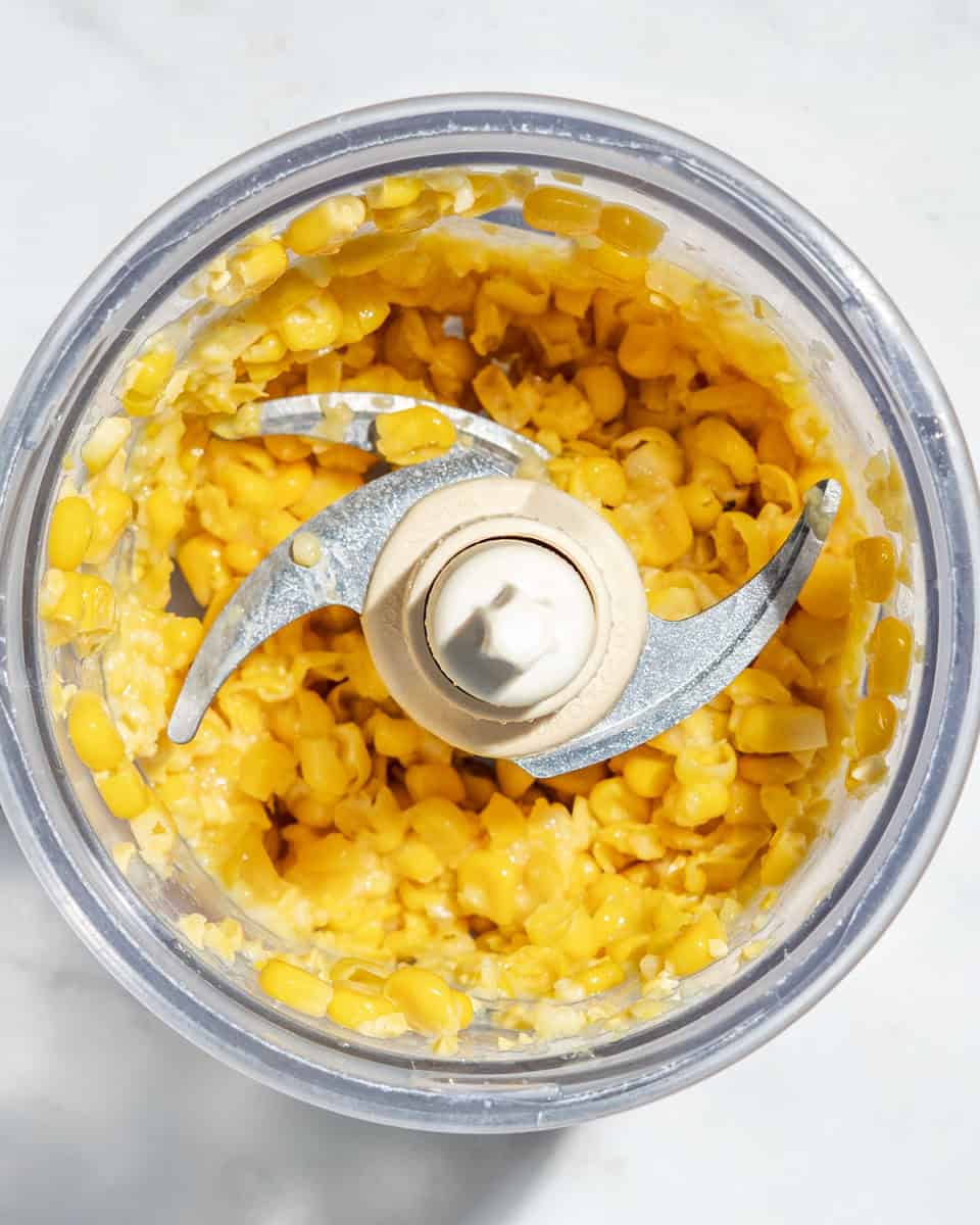 Sweet corn slightly blended in a food processor.