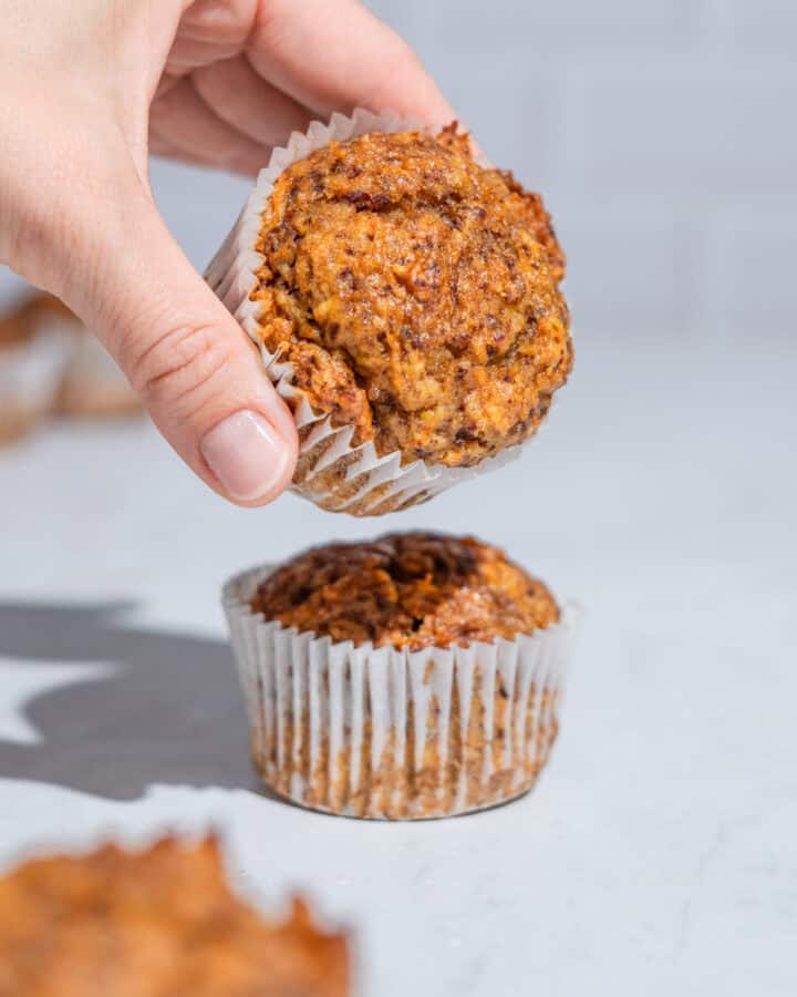 2 carrot date muffin, the upper one being taken away.