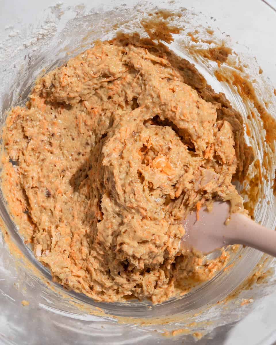 Muffin batter whisked together in a bowl.