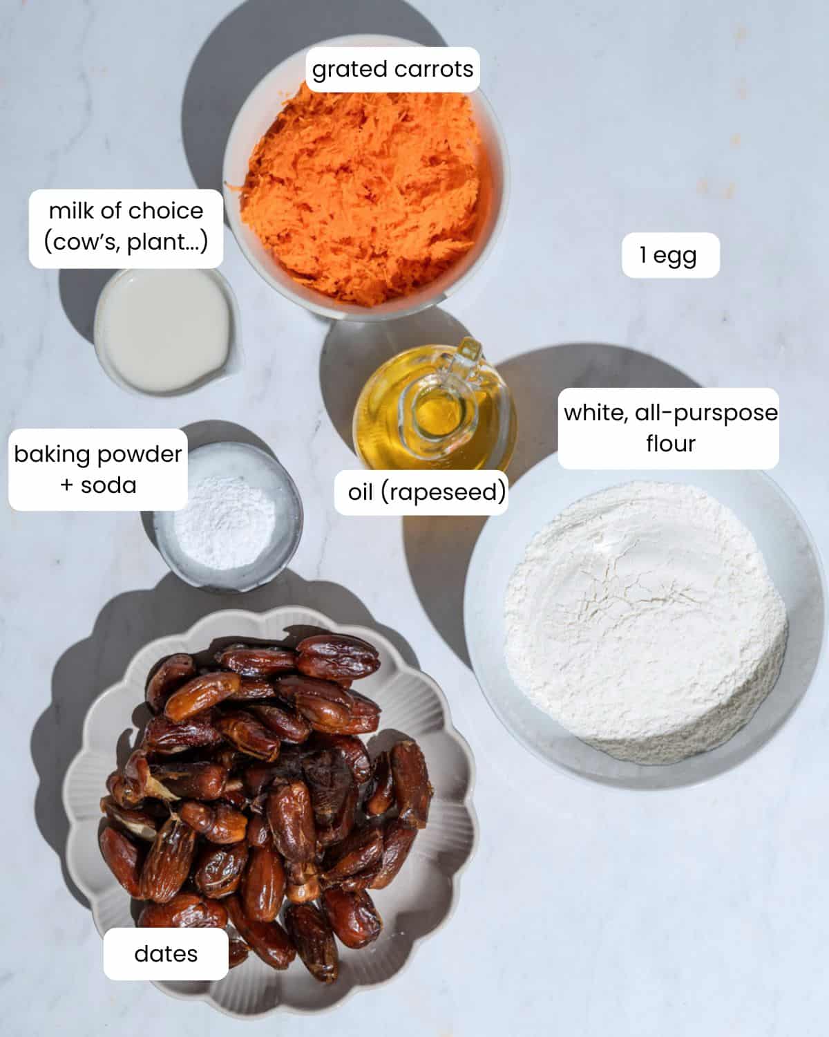 All ingredients needed to make these carrot date muffins.