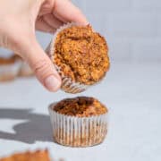 2 carrot date muffin, the upper one being taken away.