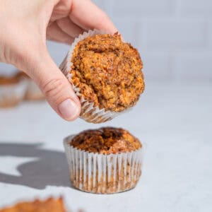 2 carrot date muffin, the upper one being taken away.