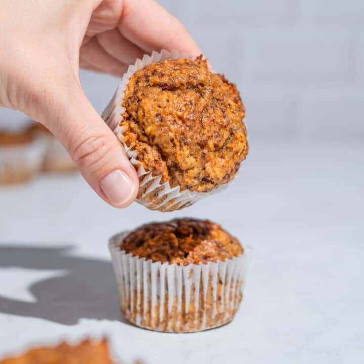 2 carrot date muffin, the upper one being taken away.
