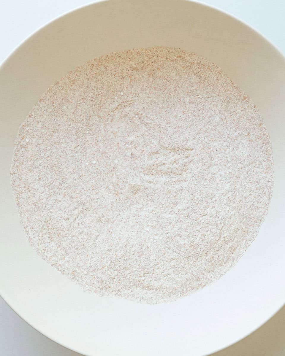 All dry ingredients whisked together in a bowl.