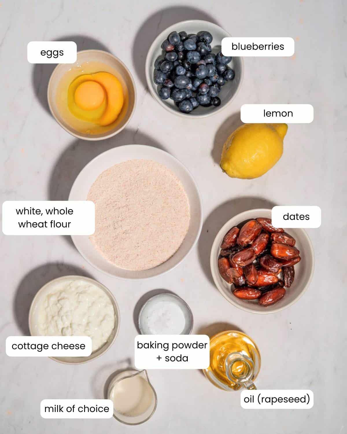 All ingredients needed to make cottage cheese blueberry lemon muffins.