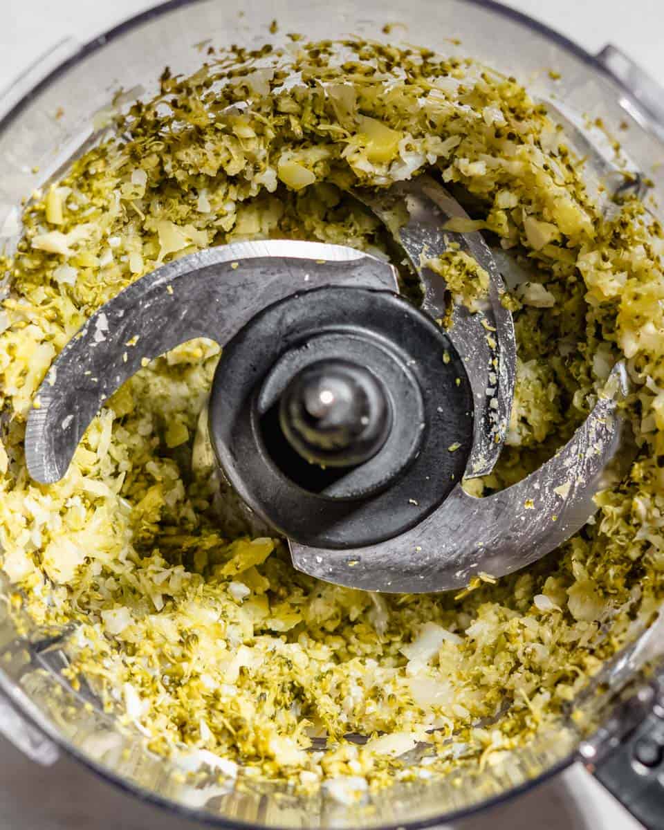 Broccoli, cauliflower and garlic cloves blended in a food processor.