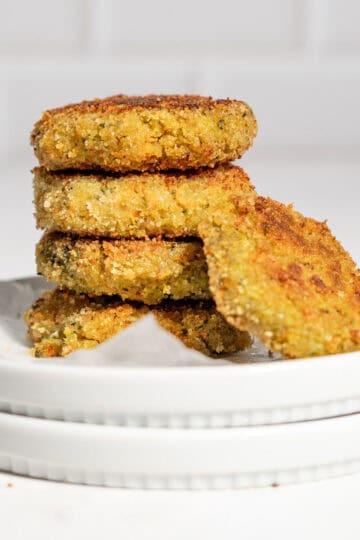 Stack of 3 veggie nuggets, one on the side.