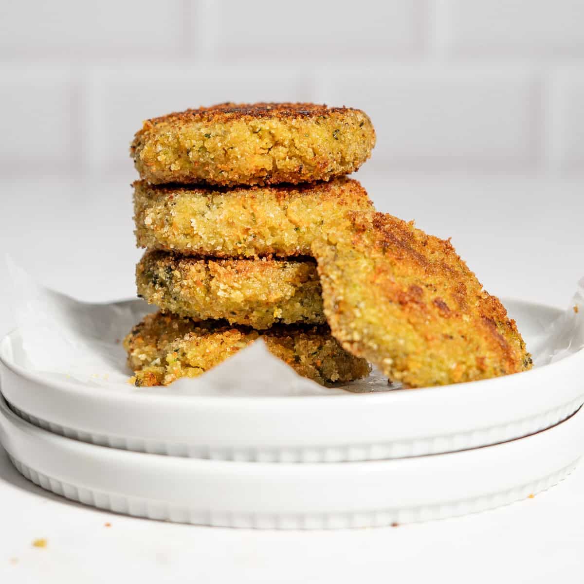 Stack of 3 veggie nuggets, one on the side.